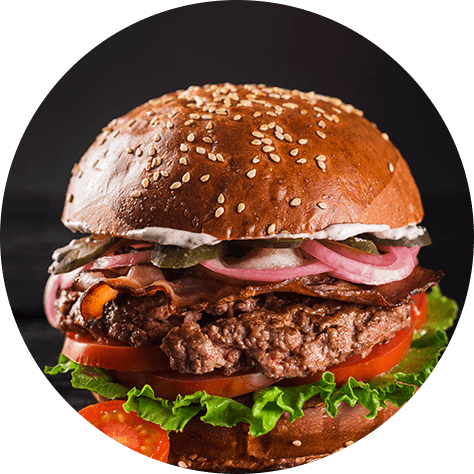 Signature Savoria Kitchen burger with fresh toppings